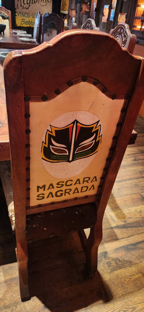 TCwrestlevotes's tweet photo. TC on assignment this week with the family and as always, somehow, someway finds himself a wrestling reference or two in the process... here's the table they sat us at for dinner https://t.co/uweAW0hkyZ