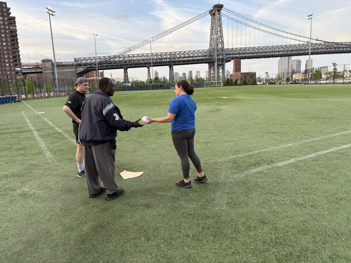 NYMSL's tweet photo. Coaches Bryan @BuzzFeedSB and Madison @PBISoftball meet with the ump before the second game of the 2026 season starts. BuzzFeed aims to repeat as NYMSL champions. #MedisSoftball https://t.co/l4wNn5HQdd