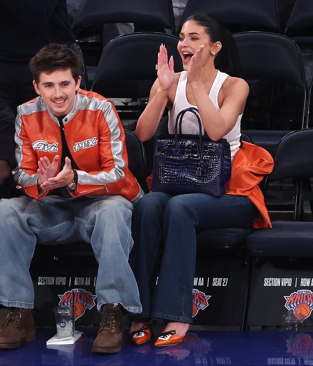 HardestFitPics's tweet photo. Timothée Chalamet wearing vintage Avirex while Kyle Jenner drippin in the MIU MIU Heels (2026) https://t.co/nR678doLfb