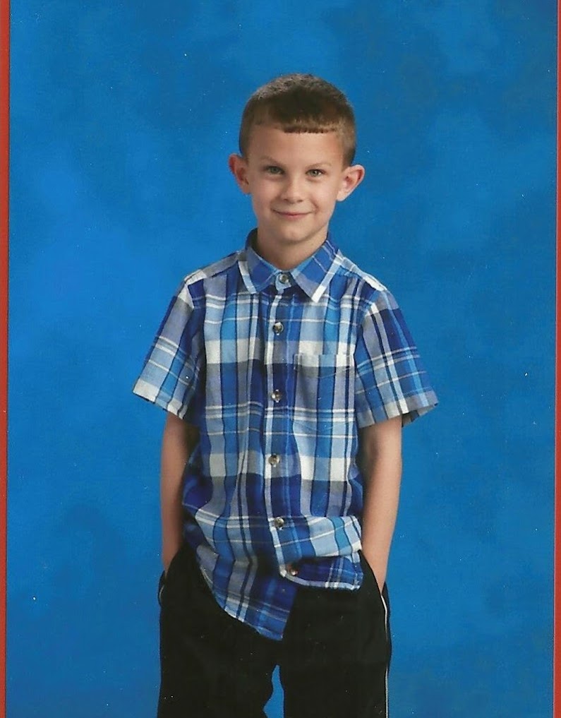 futonsrf's tweet photo. Evan's school pic from Kindergarten. He was a cute little fella and you could see the devilment in his face, lol. He's a much quieter young fella now. https://t.co/TQSmRsBfZr