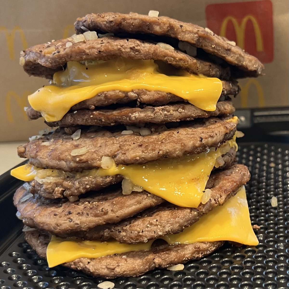 BiggestComeback's tweet photo. Here’s how I got 9 McDonald’s burger patties with pickles, onions &amp; cheese for $10.50 + tax https://t.co/FEtReZGNCl