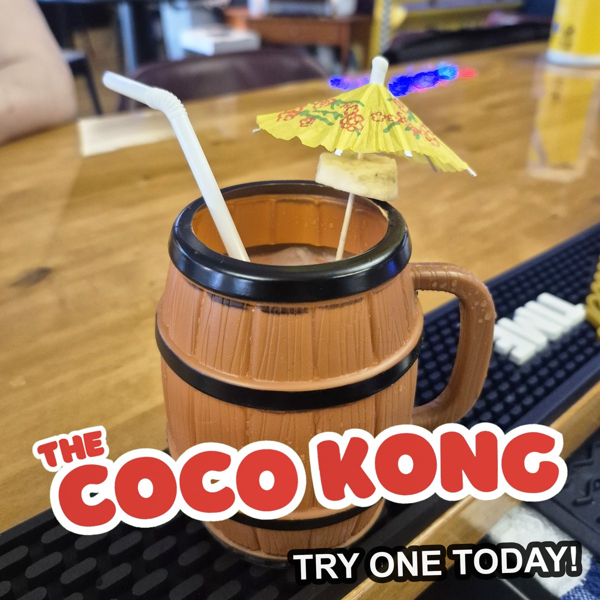 TroyRewind's tweet photo. This week's special cocktail is The Coco Kong! Have you tried it yet?

It's got coconut cream, tequila, vodka and rum, along with a banana slice! 

And for a few extra dollars you can keep the mug! https://t.co/xmGTVgDMyW