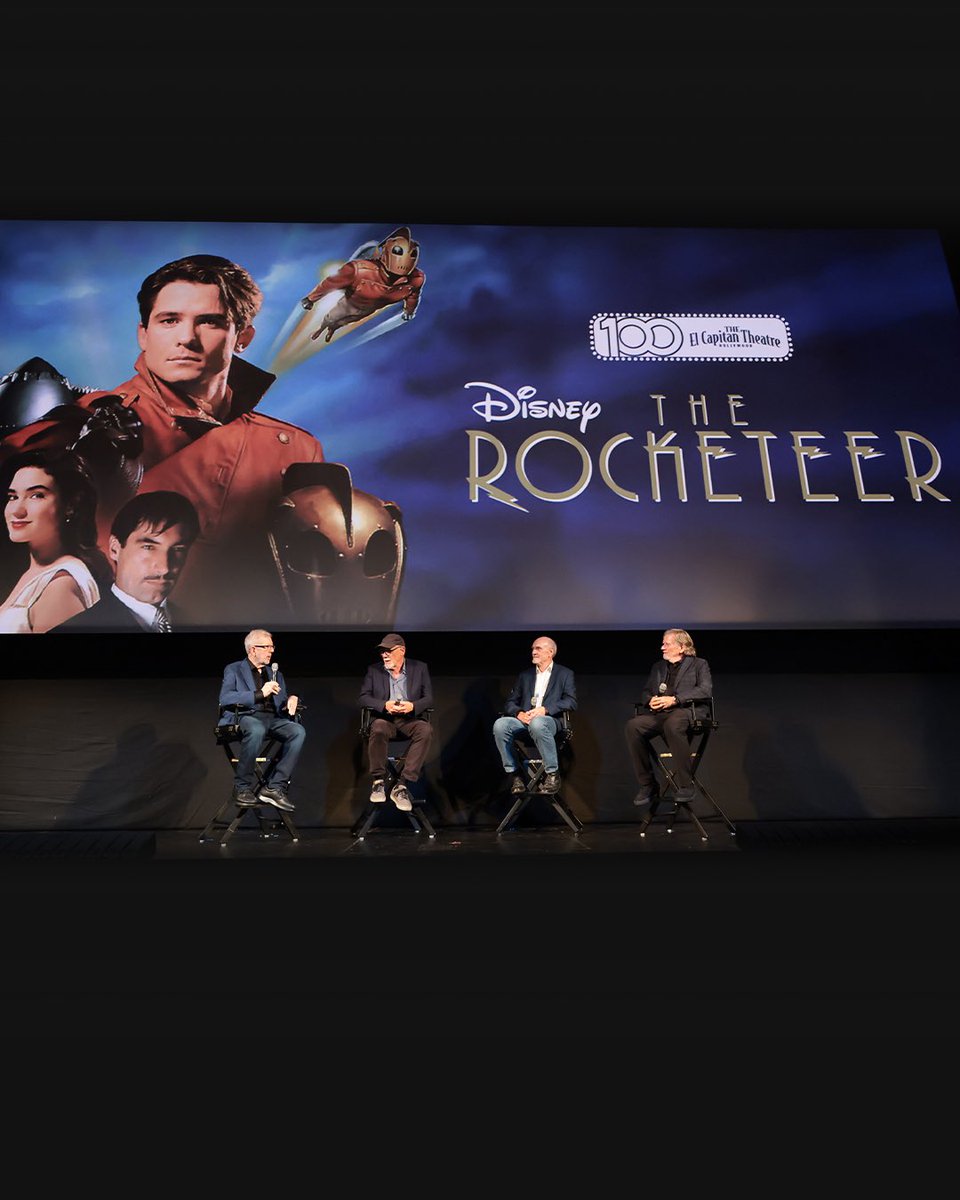 ILMVFX's tweet photo. Check out some photos from last night’s special anniversary screening of #TheRocketeer at the historic El Capitan Theatre in Hollywood! The screening included a Q&A with director Joe Johnston, executive producer Larry Franco, production designer James D. Bissell, and moderator Leonard Maltin. Watch the film now on @DisneyPlus! 🧵 1/2