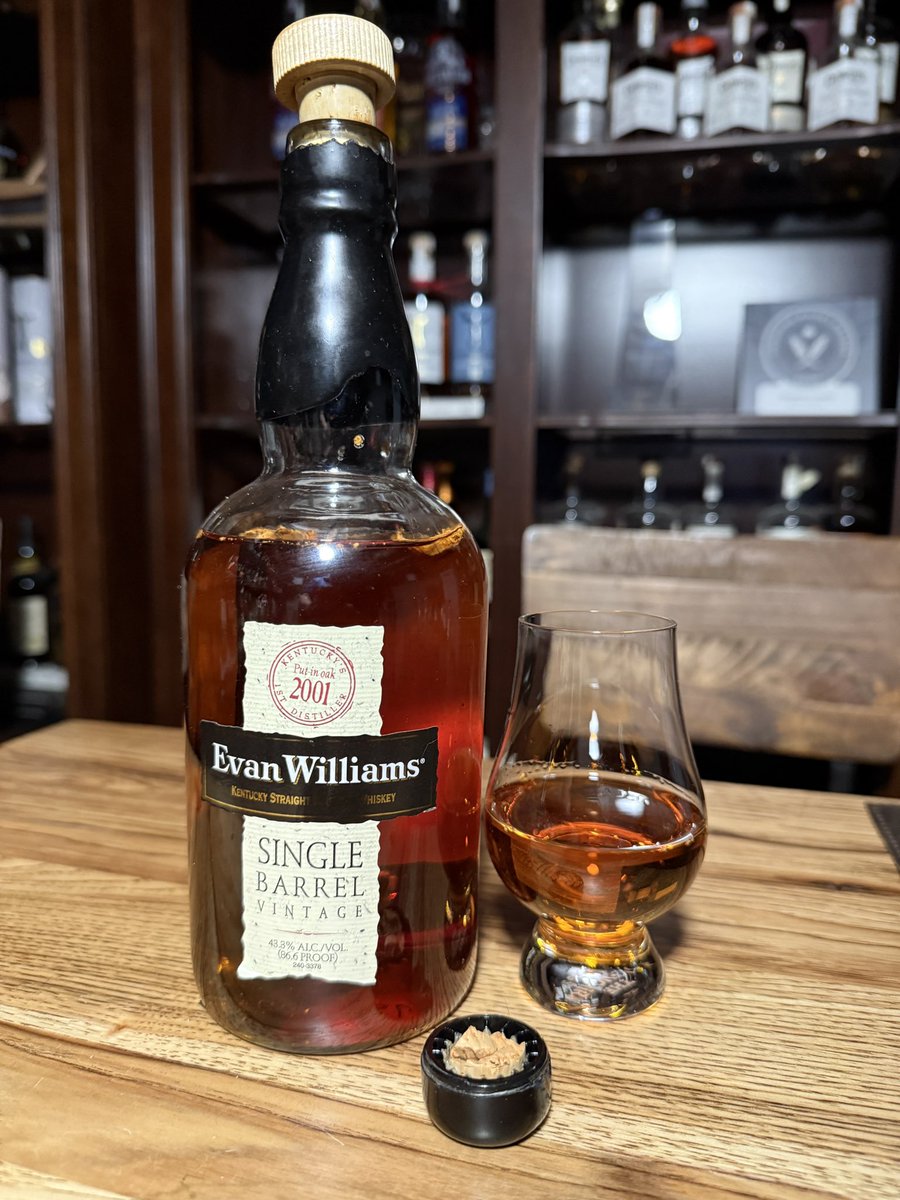 whiskycast's tweet photo. Tonight’s Stanley Cup Final #hockeydram is a vintage 2001 Evan Williams Single Barrel bottled in 2011. Too bad the cork didn’t hold up. Go Hurricanes! https://t.co/aDOYEK6yxL