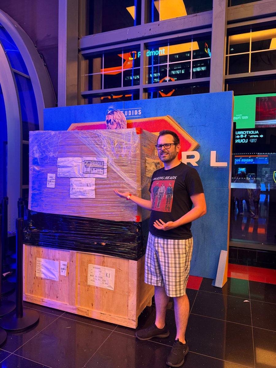 YayShawndorman's tweet photo. Can’t wait to see whatever movie is being advertised behind these crates. I’m sure it’s a good one! https://t.co/zZTPO5GSRC