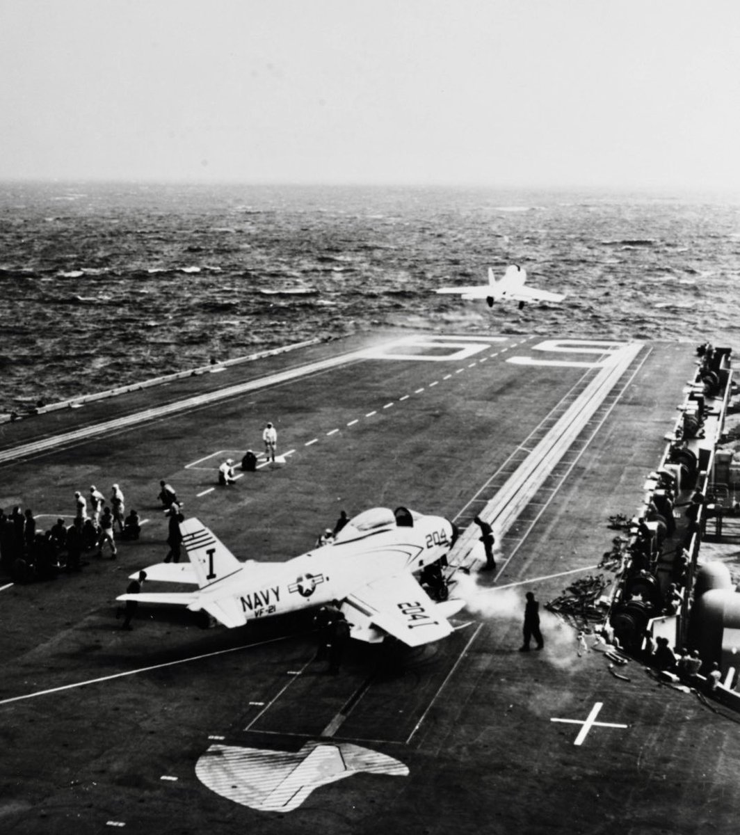 Boneyardsafari's tweet photo. North American FJ-3’s launching during USS Forrestal CVA-59’s shakedown cruise, February 1956. Note the jet blast deflector is different from modern day versions. It raised and lowered vertically and was later replaced. #fj3 #ussforrestal #cv59 #boneyardsafari #navalsafari https://t.co/8HWkP46mg3