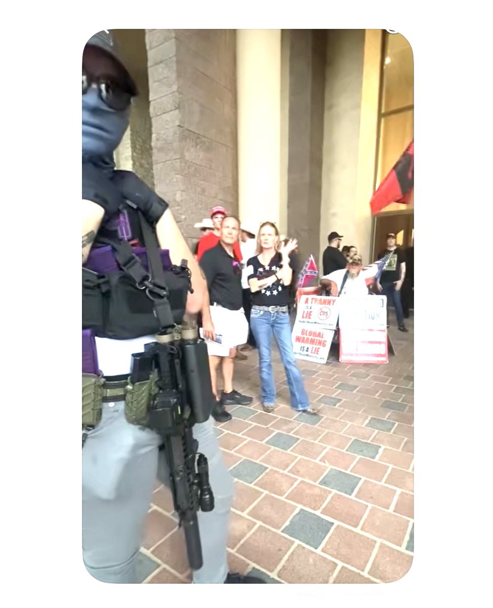 CollinDems's tweet photo. There was a “Red Neck” rally at the Frisco City Hall tonight. Some of the rally participants showed up armed and with their faces covered. Suddenly, the city has become “ground zero” for extremists supporting a strong right wing agenda. 

Screen grabs from a video- Jesse Ringness https://t.co/vUemoqsgNG
