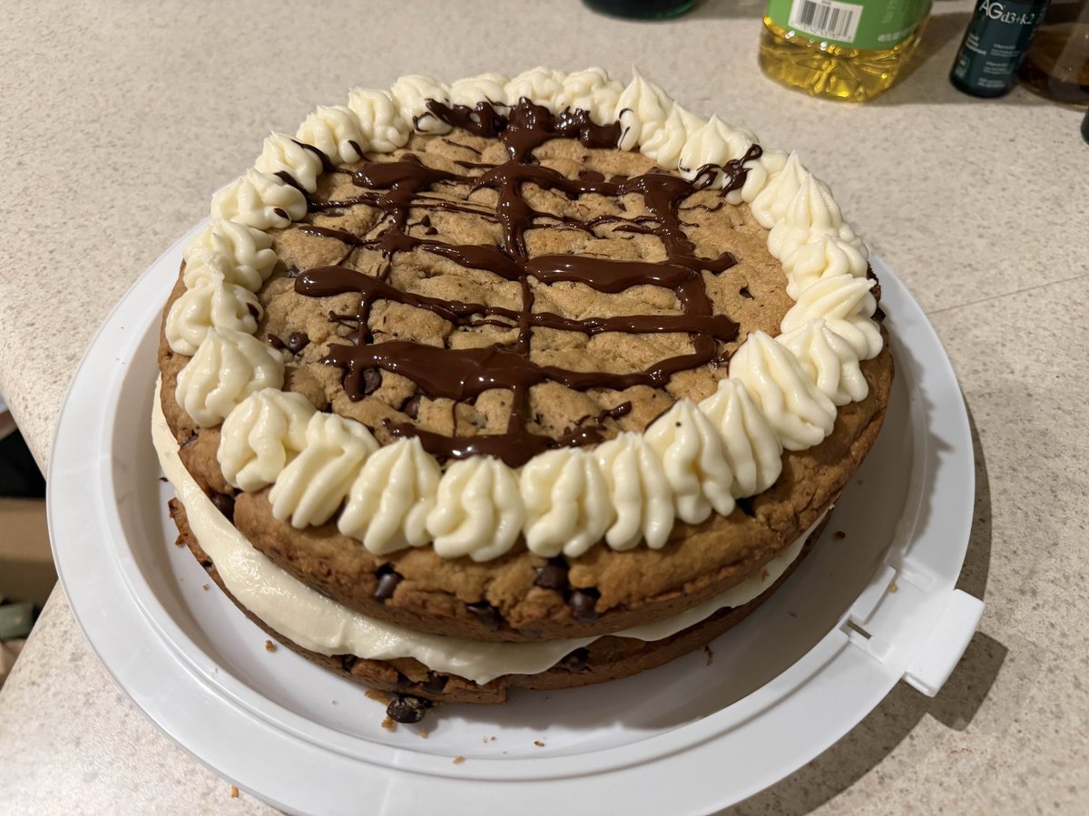 PostingMyDinner's tweet photo. Giant double layered peanut butter chocolate chip cookie cake. And taco Tuesday… woahhhhhhh!!!!!!! https://t.co/nv7Vpt6XIv