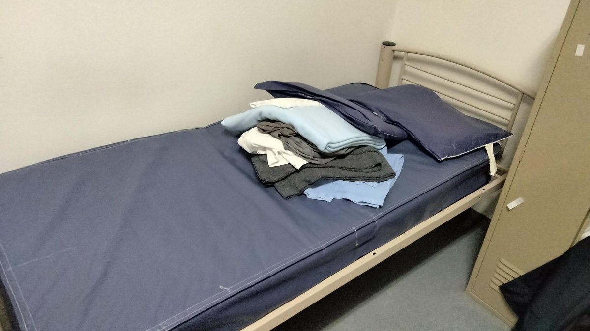 johnrockshomes's tweet photo. I am a J6er.

I was entirely peaceful.
I saw no violence or damage.

I became one of the only Americans in history to be sentenced to prison for picketing and parading.

I spent my 30 days in a halfway house.  This was my bed.

God Bless the J6ers. https://t.co/6hHI82pIHV
