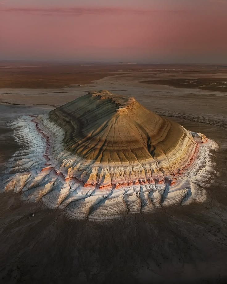 ScienceXnature's tweet photo. The "layered cake mountain" is Bokty Mountain (sometimes spelled Bakty), located in the Mangystau region of western Kazakhstan. https://t.co/s9RYzhSBq9