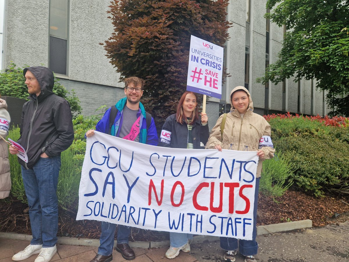 UCUScotland's tweet photo. Solid pickets and great turnout @GCU_UCU strike to defend 100 jobs and say no to compulsory redundancies. Hearing from branch president Karen Lorimer that university has no deficit and cuts are a choice not a necessity #StopTheCuts #SaveHE #SaveTheGCU100 https://t.co/P4hXNrjMbU