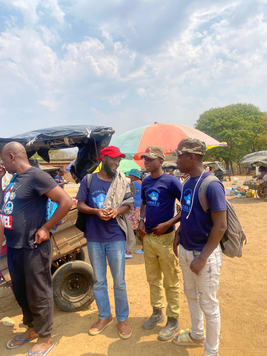 NYASHA_CHAKONA's tweet photo. Sometime back, we travelled to Lupane State University to campaign for our ZINASU presidential candidate. Little did we know that the State had already deployed its CIO apparatus to monitor our activities.

After a successful campaign, out of nowhere, university security guards approached us and demanded that we gather in a room. Naturally, we asked why. Their response was chilling, a truck was on its way to collect us and take us to a police station for further investigations.

I immediately called the then ZINASU National Secretary-General @DevineNyakudya and the then Legal Secretary @FanuelGona28265 to raise the alarm. They advised us to cooperate fully, reminding us that we had done nothing wrong.

A few hours later, detectives arrived. They proceeded to interrogate us and demanded our national identity cards. Eventually, they ordered us onto a bus. Just as things appeared to be escalating, they received a phone call and suddenly decided to release us.

What we did not know at the time was that state agents had been deployed to follow us throughout Lupane.

The man with the bald head in the picture, dressed entirely in black, was one of those monitoring us. He followed us from place to place and would occasionally position himself close enough to listen in on our conversations and hear what we were discussing.

To confirm our suspicions, we devised a simple test. Together with other comrades, @DenfordSithole , @KeeganMathe , @Prof2212 , and @SheCommander1 we deliberately boarded a bus that was heading to Victoria Falls. Moments later, we got off and made our way to the correct bus that would take us back to Bulawayo. To our surprise but perhaps not our shock the same individual immediately got off the Victoria Falls bus and boarded the very bus we had switched to.

That moment confirmed what we had already begun to suspect, we were being watched.

Yet despite all of this, we remain unshaken.

I will always carry the voices of students who refuse to be ignored. That is my mandate, regardless of how the State may choose to mischaracterise it.

I will never apologise for standing firmly with poor and struggling students, with unjustly arrested students, and with those who continue to be marginalised by a system deliberately designed to favour those with the means to exercise privilege.

The struggle for justice, dignity, and academic freedom is bigger than any attempt to intimidate us into silence.

I will continue to uphold those ideals for as long as I am Chakona Nyasha.

Yours in the struggle for Academic Freedom @Zinasuzim 
#FreeZINASU #FreeHamauswa #FreeSitima