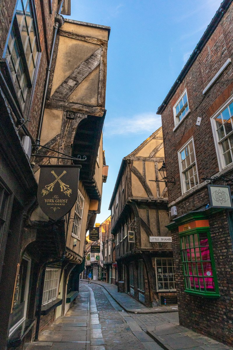 earthcurated's tweet photo. Often called the best-preserved medieval street in Europe, The Shambles in York has been a place of trade for nearly 1,000 years. Mentioned in the Domesday Book of 1086, this historic street is so old it predates the Crusades. https://t.co/l42FzxG5vU