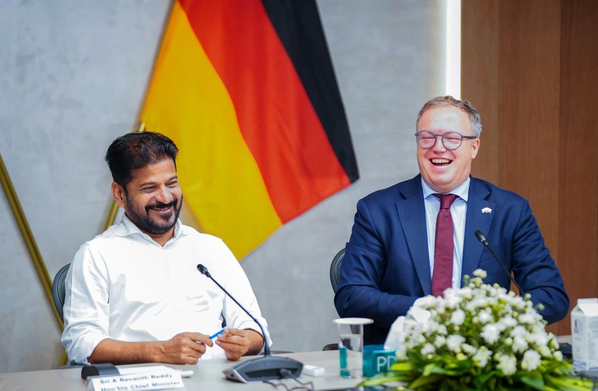 TelanganaCMO's tweet photo. Recognising Telangana’s rapidly expanding economy and its strengths in Information Technology, Life Sciences, and Advanced Manufacturing, the Government of #Telangana and the German State of #Thuringia signed a Memorandum of Understanding (MoU) to foster cooperation in key areas including technology, skill development, startups, and life sciences.

✅The MoU was signed during a high-level meeting between Hon’ble Chief Minister Shri @revanth_anumula and Mr. Mario Voigt, Hon’ble Minister-President of the German State of Thuringia, in the presence of Ministers Shri @OffDSB and Shri @VivekVenkatswam.

✅Describing Telangana as “a leading centre of progress and innovation in India,” Minister-President Mario Voigt stated that Telangana’s remarkable growth story occupies a special place in the evolving India–Germany partnership. He noted that Thuringia looks forward to partnering with Telangana to create mutually beneficial opportunities for both regions.

✅During the discussions, Hon’ble Chief Minister highlighted the growing importance of aligning skill development initiatives with emerging workforce requirements in the era of #ArtificialIntelligence. 

✅He emphasised the need to redesign skilling programmes to meet the demands of advanced economies such as #Germany, #Japan, and #SouthKorea. The Chief Minister sought Thuringia’s support in strengthening and modernising the curricula of the Young India Skills University (#YISU), Advanced Technology Centres (ATCs), and Polytechnic Institutes.

✅Responding positively, Minister-President Mario Voigt stated that a need-based and industry-oriented skilling framework could be jointly developed through collaboration between Telangana and Thuringia’s leading industries and academic institutions.

✅The Chief Minister further noted that Telangana’s skilled workforce has made significant contributions to the global technology ecosystem, including Silicon Valley, and that many global business leaders have roots in #Hyderabad. 

✅He observed that the rapid evolution of Artificial Intelligence necessitates a transformative approach to skill development, including enhanced training in foreign languages such as German.

✅In this context, Shri Revanth Reddy proposed the establishment of a German Language Training Hub in Hyderabad with the support of the State of Thuringia. He suggested that Germany’s industry ecosystem could help identify future workforce requirements, while Telangana’s Young India Skills University could tailor its programmes to meet those needs.

✅The Chief Minister also outlined his vision for #BharatFutureCity as a premier destination for global investment and innovation, with a focus on attracting Fortune 500 companies. 

✅Highlighting Hyderabad’s world-class infrastructure and business-friendly environment, he recalled the successful hosting of participants from over 100 countries during Miss World 2025, despite prevailing geopolitical challenges in the region.

✅“We are ready to partner with Thuringia and look forward to expanding collaboration in skill development, technology, innovation, and investment opportunities,” the Chief Minister stated.

✅Minister-President Mario Voigt proposed organising an official visit of a specialised delegation of German semiconductor companies to Telangana to explore investment opportunities and facilitate industry-to-industry partnerships. He reaffirmed Thuringia’s commitment to supporting industrial collaboration and addressing the business needs of Telangana.

✅Welcoming the proposal, Hon’ble Minister Shri Sridhar Babu noted that Hyderabad already hosts a strong presence of leading global semiconductor companies and is actively progressing towards semiconductor manufacturing capabilities.

✅Minister Shri Vivek Venkataswamy informed the delegation that the Telangana Overseas Manpower Company (@tomcom_gmts) has been making significant progress in German language training and overseas workforce development. He also invited the delegation to explore the skilling ecosystem being developed through the Advanced Technology Centres across the State.

✅The meeting was attended by senior representatives from the State of Thuringia, including State Secretaries Prof. Dr. Steffen Teichert and Mr. Suckert, as well as Mr. Michael Hasper, @GermanyinIndia. Several business leaders representing sectors such as Optics, Photonics and Precision Engineering, Life Sciences, MedTech, Defence, and Aerospace also participated in the discussions.

✅@TelanganaCS Shri K. Ramakrishna Rao, Special Secretary to the Chief Minister Shri B. Ajith Reddy, TGIIC Managing Director Shri K. Shashanka, and other senior officials of the Government of Telangana were also present.
#InvestInTelangana #IndiaGermanyPartnership
#GlobalPartnerships