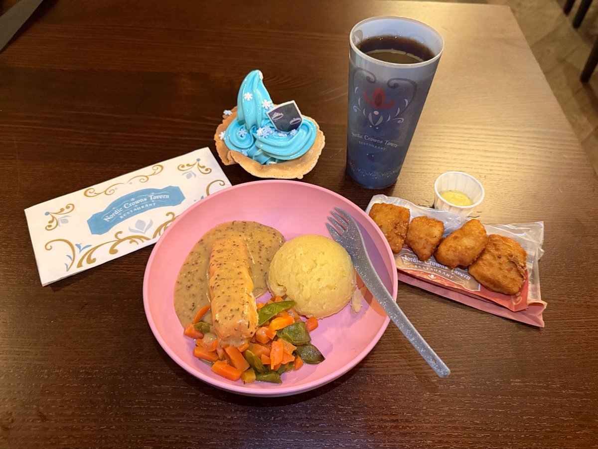 SoCal360's tweet photo. Had lunch at Nordic Crowns Tavern in the new Frozen Land at Disney Adventure World. We got the Salmon Plate, which came with ice cream and a drink, for $27.83. We also got Fish Fritters for $6.96.

The Salmon Plate was actually good! 👍 https://t.co/q23HVjk4yk