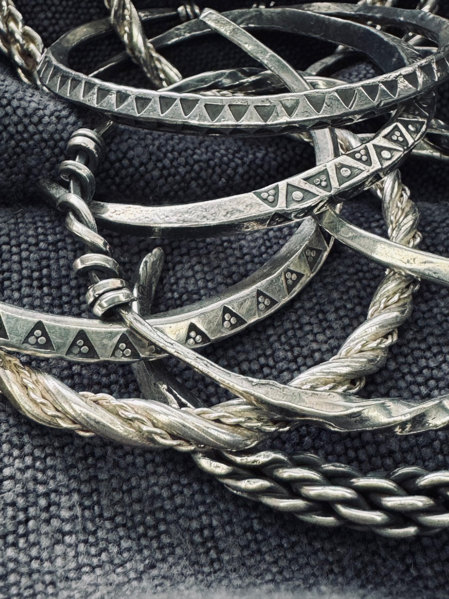 caledonianforge's tweet photo. Viking stye money rings - commonly used in Early Medieval times as currency, now as precious heirlooms. These are all ready for posting! Which stye is your favourite? Twisted wire, stamped details, or intricate head terminals like the goddess Morrigan’s crows shown here? https://t.co/M2c92hBHfm