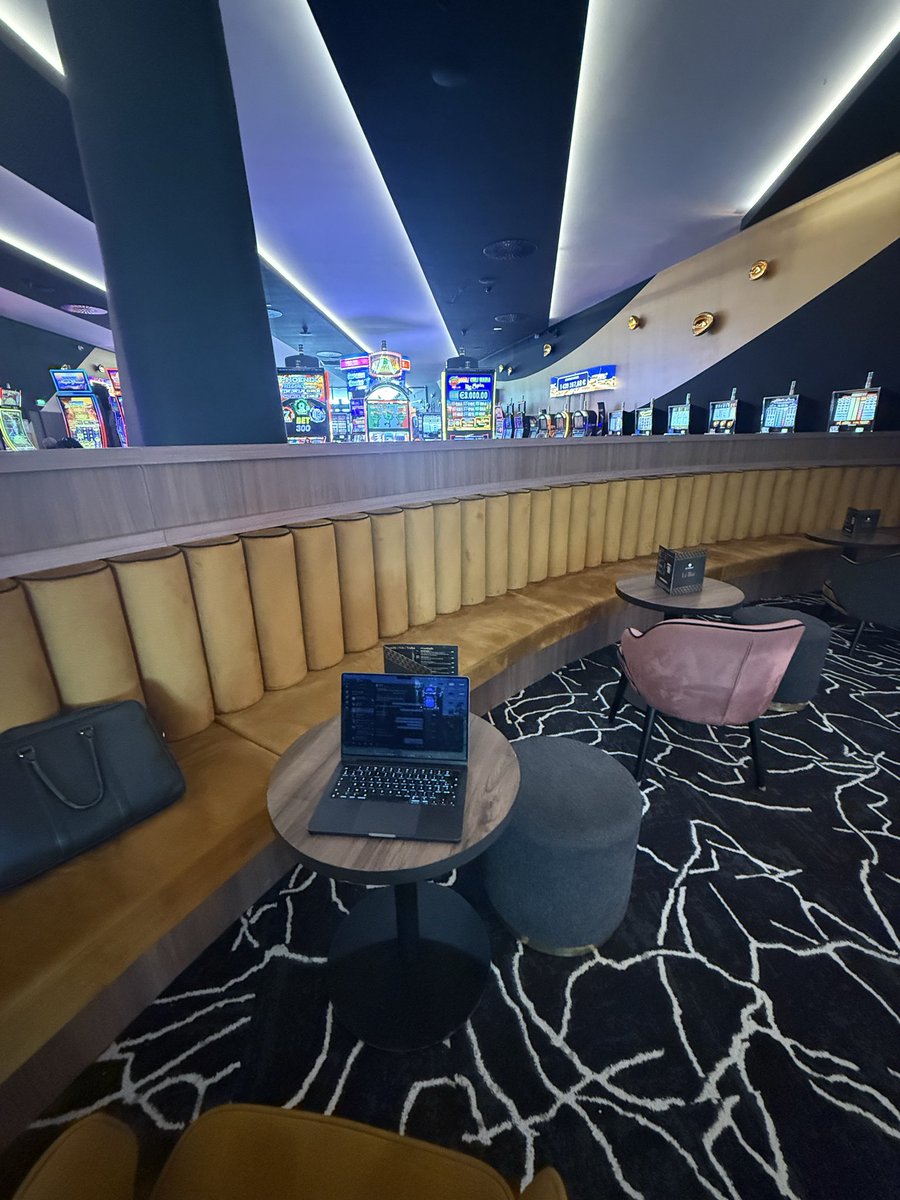 RailgunIntern's tweet photo. Some people pay hundreds a month for a coworking space. I just go to the casino.

- Top-notch wifi
- Free coffee (unlimited, no “fair use policy”)
- Networking opportunities (got my lunch comped by an old lady I met in the smoking room)
- The only office where everyone around you is more down bad than you are, holding BTC

My standing desk is a slot machine and my posture reflects that.