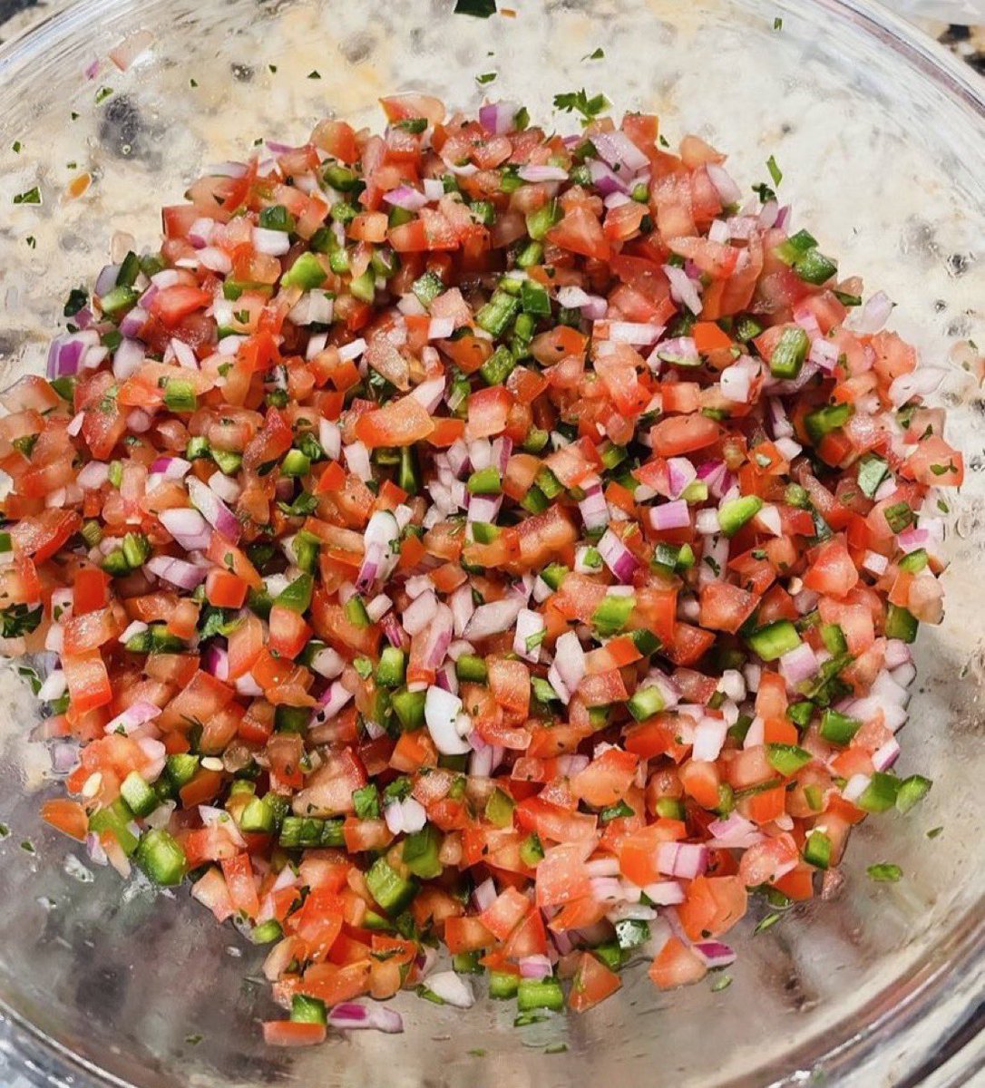 coookwithchris's tweet photo. Perfect summer recipe: Pico de gallo!

Ingredients:
-6 roma tomatoes
-1 small red or white onions
-3 jalapenos (seeds depending on how spicy you want it)
-1 clove of garlic (optional)
-Big pinch of cilantro
-Juice of 2 limes
-Salt

Dice everything until its the size you desire and stir! 

Adjust salt as necessary.
