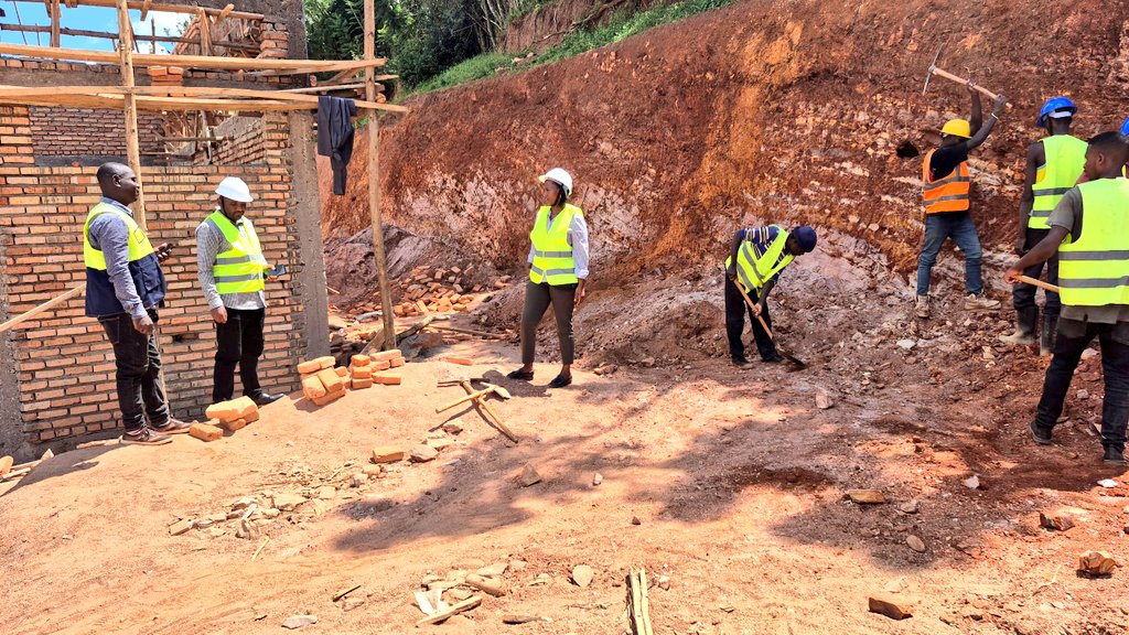 GisagaraDistr's tweet photo. The Vice Mayor @Denise_Dusabe01 visited the multi-year project for the construction of two dormitory blocks at TSS Gikonko. She advised the engineers on site to speed up the work in order to achieve the performance contract (PC) target set for the 2025–2026 fiscal year. https://t.co/7nSf1SFGmo