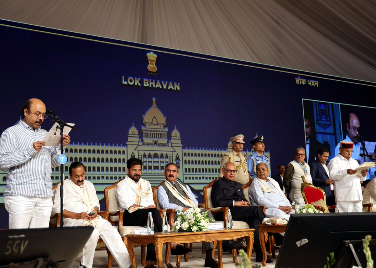 TcGehlotOffice's tweet photo. Hon’ble Governor of Karnataka Shri Thaawarchand Gehlot administered the Oath of Office and Secrecy to Chief Minister Shri D.K. Shivakumar, Deputy Chief Minister Dr. G. Parameshwara and Ministers at a ceremony held at the Glass House, Lok Bhavan, Bengaluru. https://t.co/yOz1d65kpf