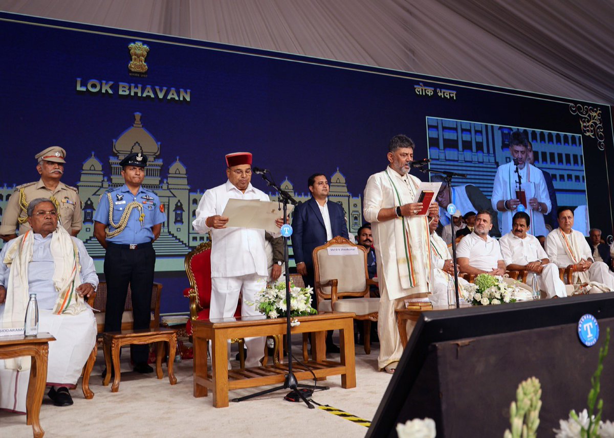 TcGehlotOffice's tweet photo. Hon’ble Governor of Karnataka Shri Thaawarchand Gehlot administered the Oath of Office and Secrecy to Chief Minister Shri D.K. Shivakumar, Deputy Chief Minister Dr. G. Parameshwara and Ministers at a ceremony held at the Glass House, Lok Bhavan, Bengaluru. https://t.co/yOz1d65kpf
