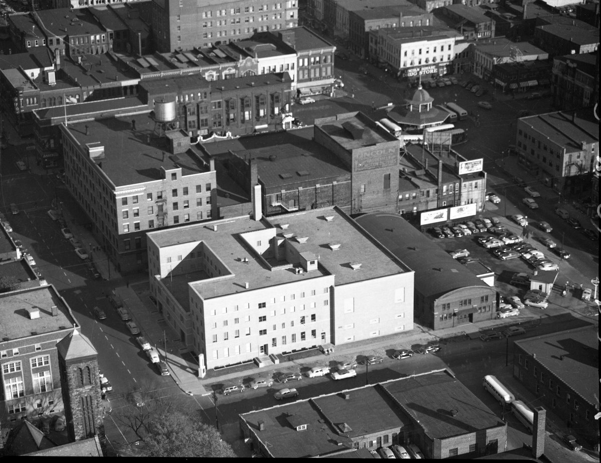 LibraryDecatur's tweet photo. Its fun to build a new YMCA! Mid 1950's. We have the selection space, starting construction, dedication, and the structure itself. How cool is the last picture with the Transfer House and the corner with Bolay's Hobbies. How much time did you spend here? https://t.co/s6l8Iv5NOg