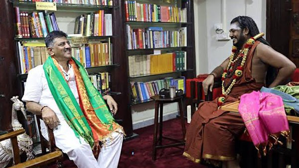 SriNithyananda's tweet photo. THE SUPREME PONTIFF OF HINDUISM, BHAGAVAN SRI NITHYANANDA PARAMASHIVAM extends His heartfelt congratulations to Honorable Shri D. K. Shivakumar on taking oath as Chief Minister of Karnataka. #kailasa #nithyananda @DKShivakumar https://t.co/uk4Hozzz9r