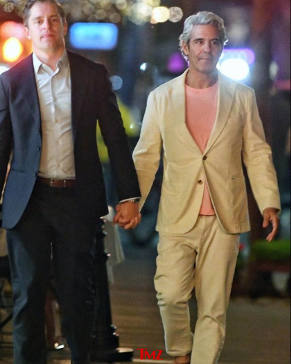 TMZ's tweet photo. 🥰 Andy Cohen holds hands with Kevin Sobieski, leaving a dinner date.

Exclusive details: https://t.co/IXgn4AkX6f https://t.co/OAKuCt1iyI