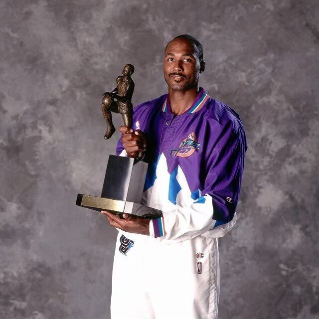 UtahSportsScene's tweet photo. 🗓 On This Day in Utah Sports History – June 3, 1999
Karl Malone was named the NBA’s Most Valuable Player for the second time in his career!
The Mailman averaged 23.8 points, 9.4 rebounds, and 4.1 assists during the lockout-shortened season, leading the Utah Jazz to a 37-13 record.
This made him just the 9th player in NBA history to win the Maurice Podoloff Trophy twice (he also won it in 1997).
One of the greatest to ever do it for the Jazz. 💜 #TakeNote #UtahJazz #KarlMalone