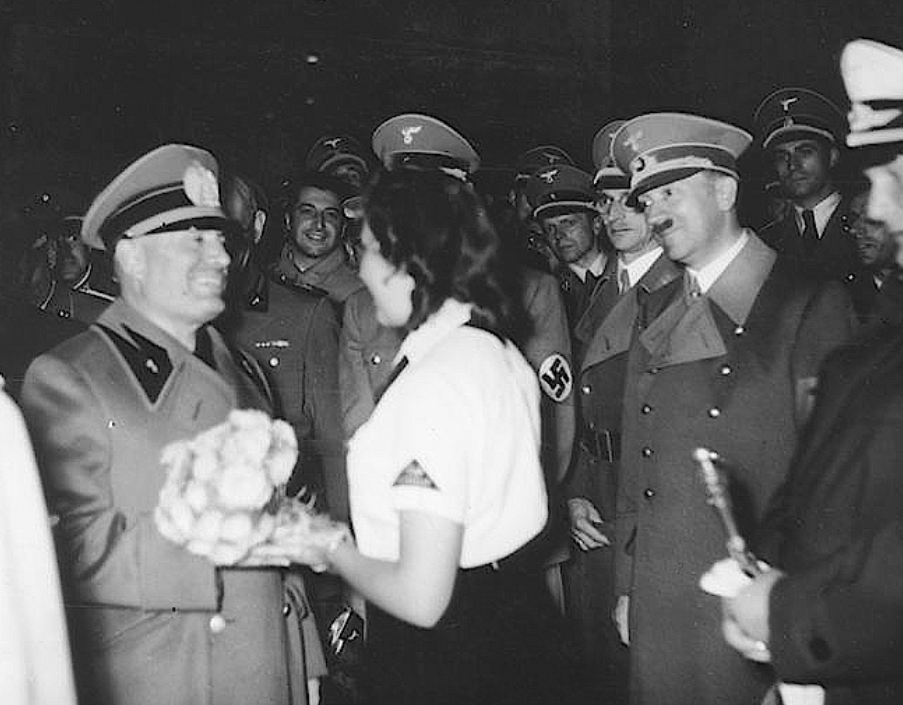Vortexkuni's tweet photo. Completely zoned out, vacant smile, standing stiffly with arms down by the side, wow Hitler is Literally Me whenever I was out with my mum and she would start talking to someone https://t.co/82ne304jpc