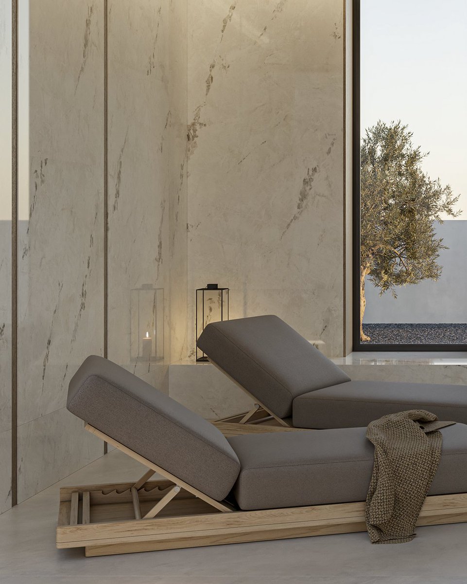 Dekton's tweet photo. Dekton Bering brings visual solidity and depth through subtle grey accents and a refined light-toned surface. In this bathroom, it creates clean, continuous planes that beautifully contrast dark fixtures and warm lighting. https://t.co/okGkST9aKX https://t.co/0VOCZCxiub