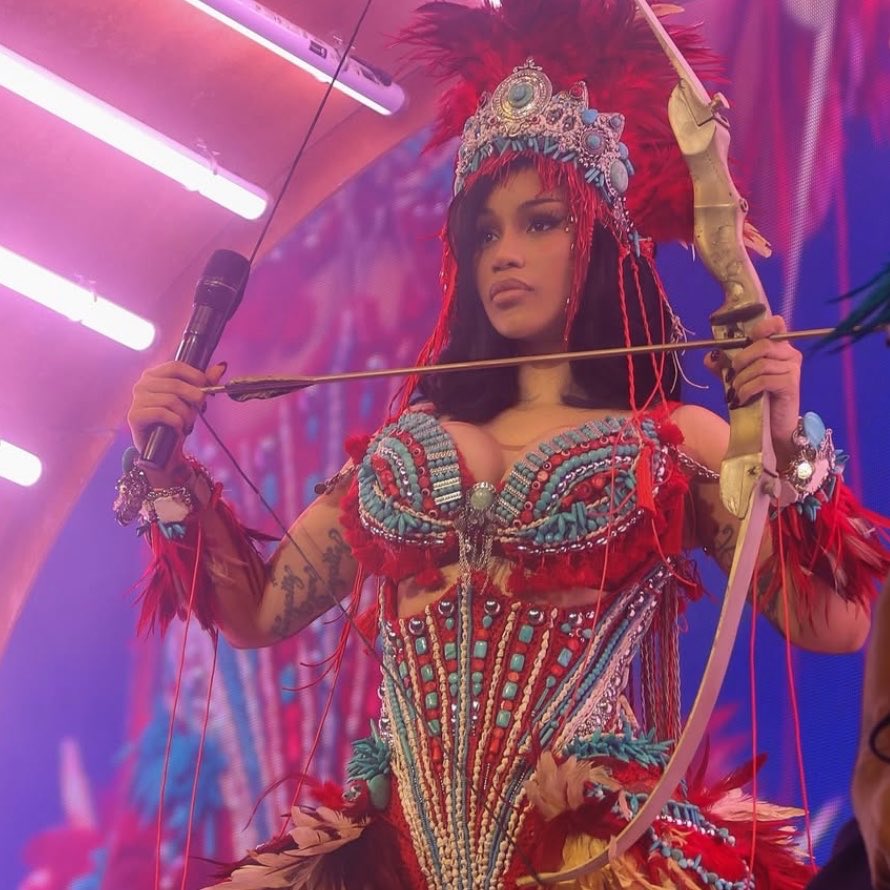 theecardiroom's tweet photo. Cardi B seems to be teasing something with an Ochosi-inspired emoji in a new message to fans:

“However…🏹…muah😘💋”

Could this be the theme of her next era? 👀 https://t.co/EfA2IejT7Z