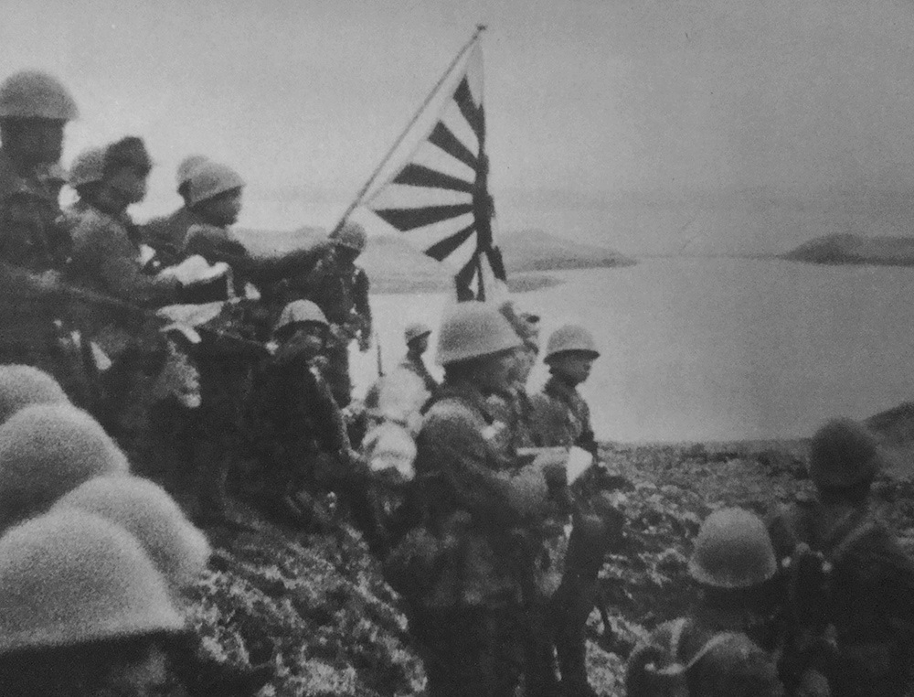 VoicesofWW2's tweet photo. Troops of the Japanese Special Naval Landing Force raising the Japanese naval ensign on Kiska Island, Aleutian Islands, 6 Jun 1942 https://t.co/imk0umzgXC