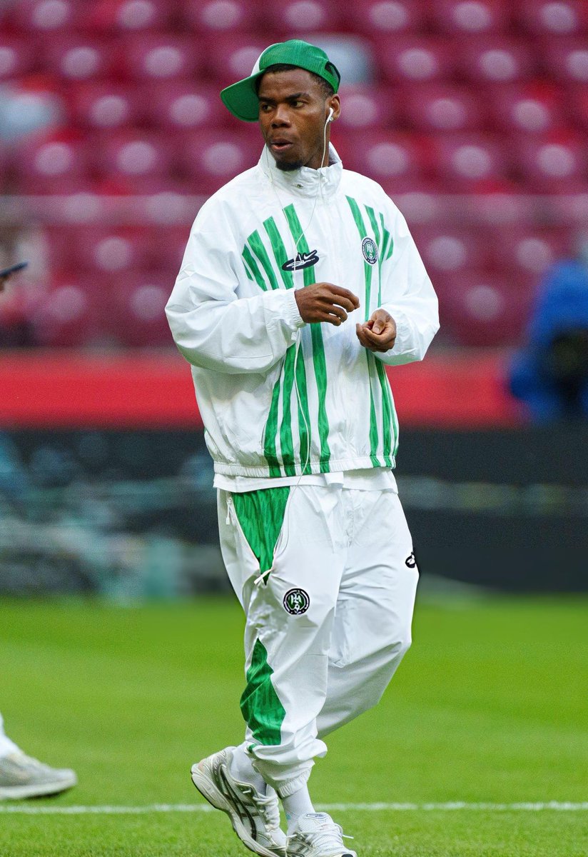 NUKSAwards_'s tweet photo. The Super Eagles rocked the Nike x @olaoluslawn pre-match kit 🦅🔥

It was meant to be Nigeria’s World Cup kit…

Still, you can’t deny this jersey is a masterpiece 🇳🇬 

Definitely a HIT 💯 

#NUKSAwards https://t.co/6yYDHxiKLv