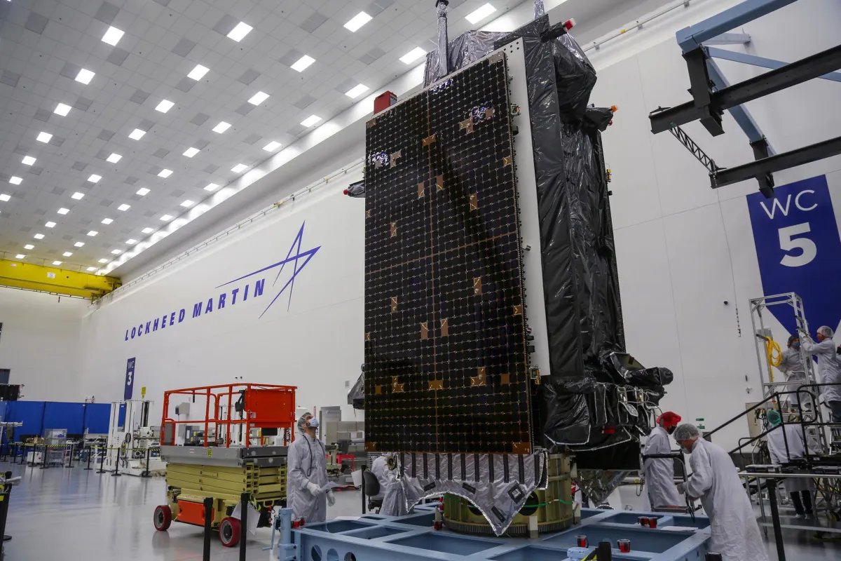 FootDolphin's tweet photo. That's strange, since my company designs and builds satellites.  In fact, we received a $7.2 billion contract for 22 new GPS satellites.  Thousands of people working on the contract.  Here's a picture of what a GPS satellite looks like in the factory.  I'll let them all know they're fake though