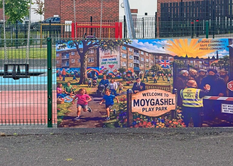 BigOwlDream7's tweet photo. IRELAND: ‘Muslims not welcome’ sign put up at children’s playpark

A “racist” display claiming ‘Muslims are not welcome’ has been put up at a children’s playpark in Co Tyrone.

Police said they are treating the offensive display in the loyalist village of Moygashel, near Dungannon, as a “hate incident”.

The large sign has been fixed to the fence of a play area owned by Mid Ulster District Council.

It includes an image of a group of white people and children playing in a bright and colourful playpark.

A Union flag can be seen along with what appears to be a British army veteran, with medals on his chest, standing beside a sign that reads “welcome to Moygashel Playpark”.

The image also includes several men, believed to represent Muslims, wearing headscarves and beards in a darkly coloured setting.

In front of them is a barrier and a stop sign while a small white man can be seen holding up his hand in a ‘halt’ motion.

He is wearing a hi-Vis vest with the words ‘our community, our rules”.

The image also includes the words “not welcome, not wanted, not here”.

An accompanying message posted on a Moygashel Bonfire Association social media page reads: “Call us racist, call us ‘far right’. Your labels carry no weight here.

“Protecting our women and children is a fundamental duty that overrides any political label, insult or smear designed to silence honest concern.

“We will never apologise for putting our women and children’s lives and well-being ahead of your political correctness.

“Our stance is non-negotiable.” Located near Dungannon, the village of Moygashel. Ireland. [edited] 

Well done I say- we will not apologise for speaking our truth- even if the 'powers that should not be' don't want to hear it- fek em.