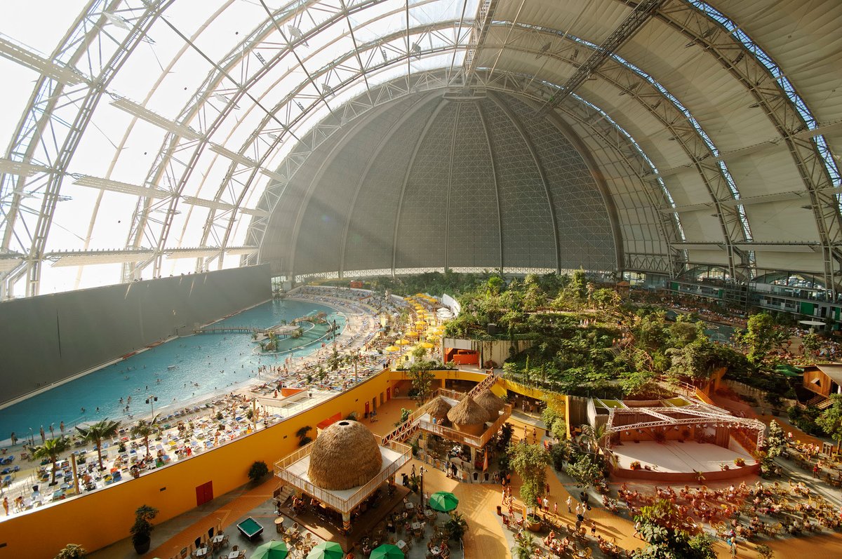 runaway_vol's tweet photo. lets not forget that germany turned the hangar for their failed cargo blimp project into a tropical spa the size of central park https://t.co/6MrO5JX8i5