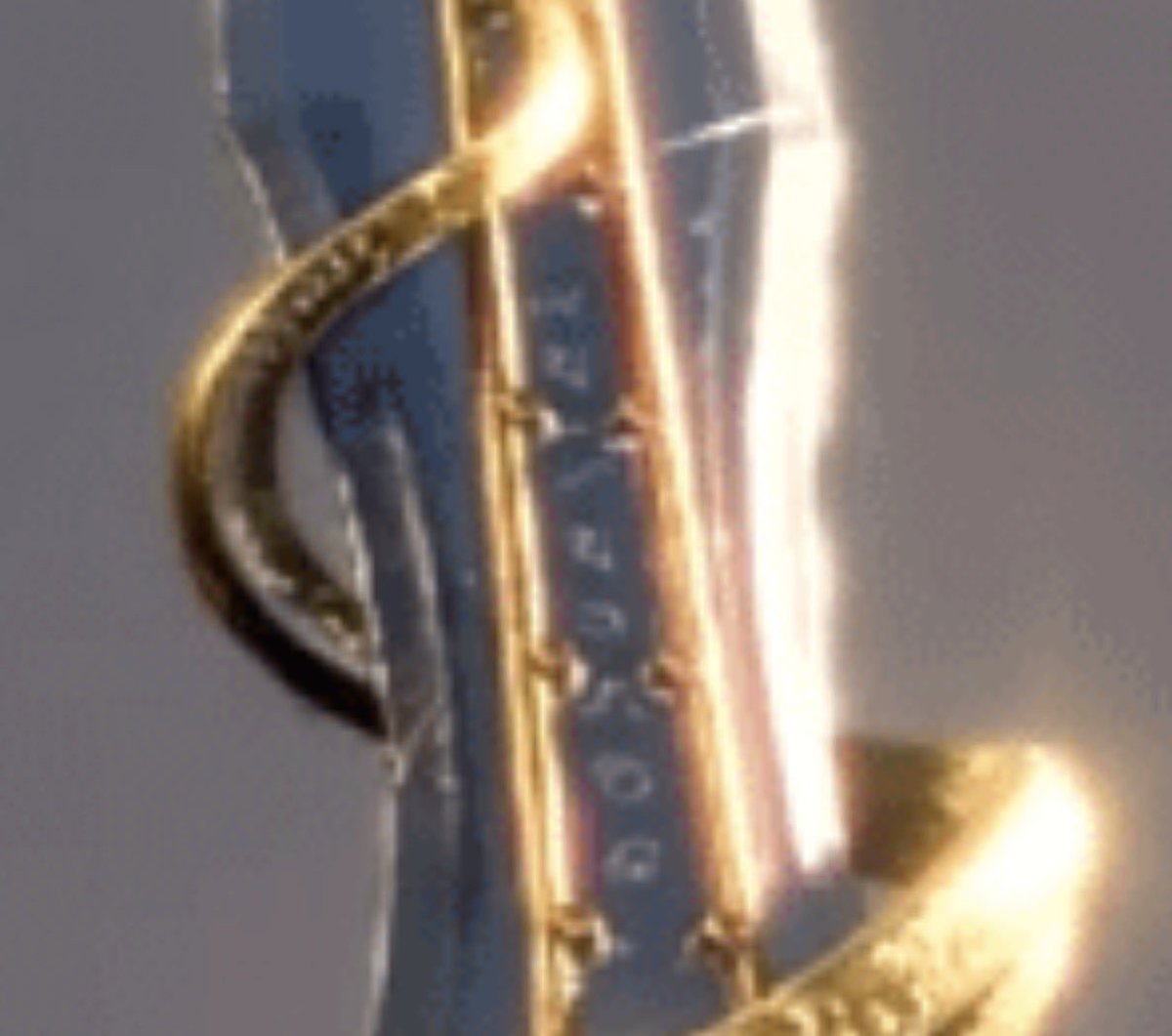 TwentyOneVtoobs's tweet photo. @BatFamNerd The hilt is a dragon and the blade has markings on it if that means anything https://t.co/nWktXidkP8