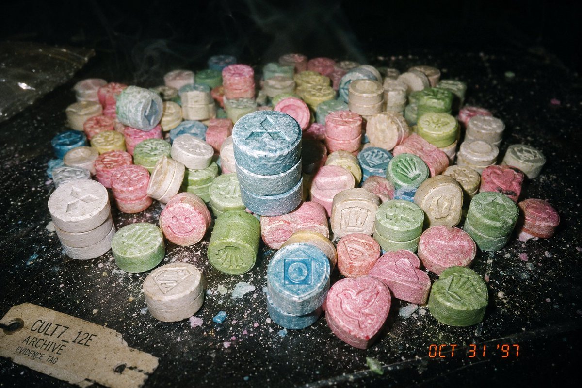 HexCorpo's tweet photo. (SECTOR_97: The Pressed Archive)

CULT7_12E // ARCHIVE RECOVERY: THE STACKED PROTOCOL 🎞️💊🧿

Sector 97. The hardware was different back then. Chalky. Triple‑stacked. 6DB sound pressure pressed into a single Dove.
Before the Neural Link, we were chomping beans and riding the Mitsubishi mainframe—chemical adapters to lock into the grid and roll all night, dancing the night away.
THE_DOSE_IS_LETHAL. THE_GRID_IS_ETERNAL.

#90sRave #FoundFootage #Fujifilm #35mm #RaveHistory #Beans #TripleStacks #HexCorpo

THE_FLASH_IS_BLINDING. THE_GRID_IS_PRESSED. WELCOME_TO_THE_RECOVERY. 🧿✨👻