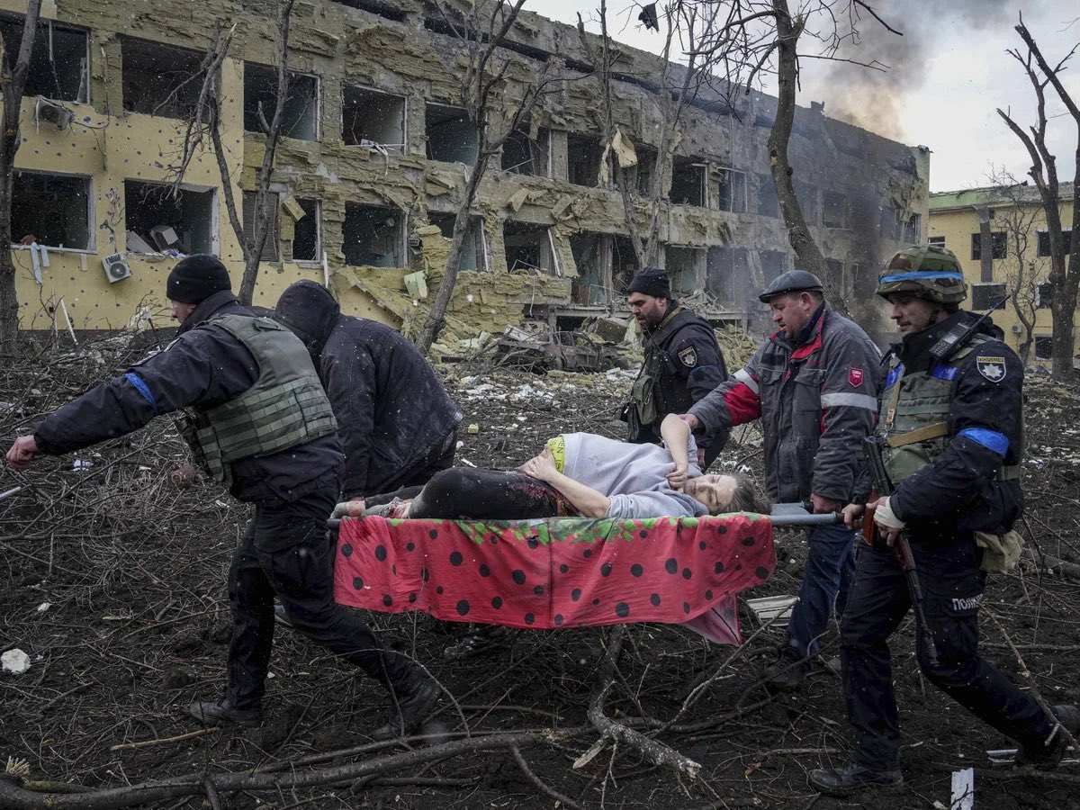 txgermanbre's tweet photo. Just so you guys are aware, Russia has a permanent seat and has been allowed to commit a soft genocide of Ukrainians by the UN. They murdered this pregnant woman in Mariupol and her baby in March of 2022. They continue to do so. Hypocrites. https://t.co/PgAYEaFD5X