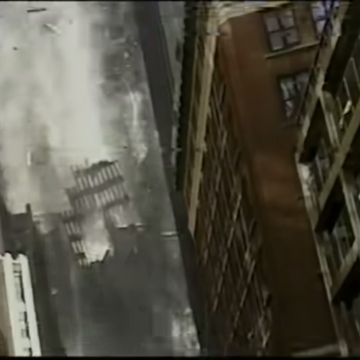 Daytobehappy's tweet photo. This is a photo of the South Tower plummeting to the ground on 9/11 with so many people trapped inside like my mother and it didn't even take 25 years for New Yorkers to forget but we never will! https://t.co/S8HY3ldNRp