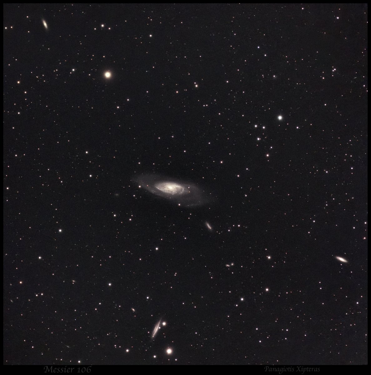 xipteras's tweet photo. 🌀 Messier 106 (NGC 4258) sits in Canes Venatici, the Hunting Dogs, about 23.7 million light-years away (±1.5). At magnitude ~8.4 and 18.6′ × 7.2′ across, it covers roughly two-thirds of a full Moon's length in the sky. It's an intermediate spiral, SAB(s)bc, holding something like 400 billion stars across a disk near 135,000 light-years wide, close to Andromeda's scale.

🕳️ What sets it apart is the engine at its heart: a supermassive black hole of about 40 million solar masses, feeding actively enough to carve a second, "anomalous" pair of arms out of hot gas. Those extra arms barely show in visible light but blaze in X-ray and radio. Its water-maser disk also made M106 one of the most precisely measured distances in the universe — a yardstick astronomers lean on to calibrate the cosmic distance ladder.

🔭 From central Europe it rides high — almost overhead. Spring evenings are the real season for it; right now in early June you catch it in the first proper dark, already west of the meridian and drifting toward the northwest before the short summer night gives out.

🔭🤖 Here's what I keep coming back to with this frame: it wasn't shot under dark skies with a big refractor. This is my Vaonis #Vespera II smart telescope, working from my rooftop here in Germany — 3 hours and 54 minutes of integration, stacked through the city's glow. A 50 mm aperture, no observatory, no perfect site. And still the core, the main arms, and a scatter of faint companion galaxies came through — its galaxy friends drifting around it in the field. If you've ever told yourself you need a mountaintop and a fortune to start, let this be the argument against that. Patience and a small automated scope in the backyard will already show you a galaxy 24 million light-years out.

🦣 Here's the part that quiets me every time. This light left around 24 million years ago, so there is simply no human chapter to tell. No cities, no writing, not even our earliest ancestors — the lineage that would one day lead to apes was only just stirring in Africa. The land belonged to others entirely: three-toed browsing horses, the long-limbed bear-dogs, the very last of the giant hornless rhinos moving under skies no human eye had ever read.

🌋 Earth back then stood on the threshold between the Oligocene and the Miocene — warmer than today, but already cooling, with Antarctica locked under ice. The Alps were still pushing upward, the Himalaya climbing as India ground northward, and the first great grasslands were spreading across drying continents. And the dinosaurs? Gone for more than 40 million years before this light even set out. The fossil record we dig through had already been buried deep by the time these photons left the galaxy.

✨ Some objects deep in outer space just don't ask for our legends, for pur stories. They just ask us to look, and to feel how small and brief our own moment really is against all that quiet distance. #Messier106 #galaxies 

Thanks for reading and Clear Skies /@xipteras