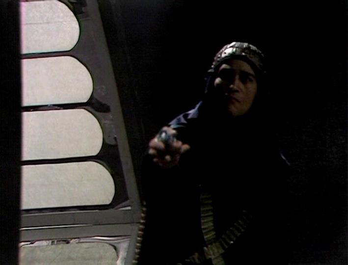 blakes7bot's tweet photo. A11 - Bounty

BLAKE:  Get down! [Throws his neckband at the guard, who is caught in its explosion. He leaves the cell. Cally and Gan follow.] No, you stay back. Keep out of sight. Get him in there. [Gan carries the body into the cell.]
AVON:  Vila.
VILA:  What? https://t.co/QDkR97rGqN
