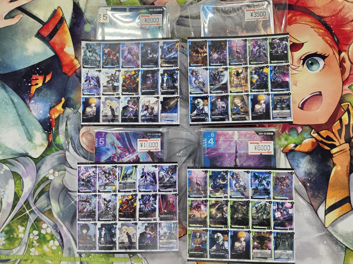 ガンダムカードゲーム】 店頭ショーケースに販売用のデッキを並べまし