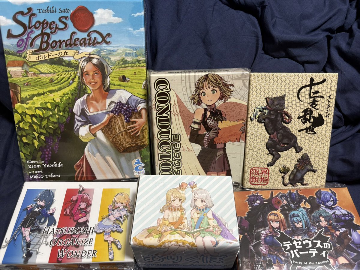 TAKAMY_06's tweet photo. 【本日の戦利品】
予約できなかった大箱を抱えて会場を移動するのは体力を使いますね…予約大事…

来週以降に機会を見て遊ばさせてもら追うと思います。まずはルール把握とコンポーネント確認ですかね。 https://t.co/305Iq0iGr1
