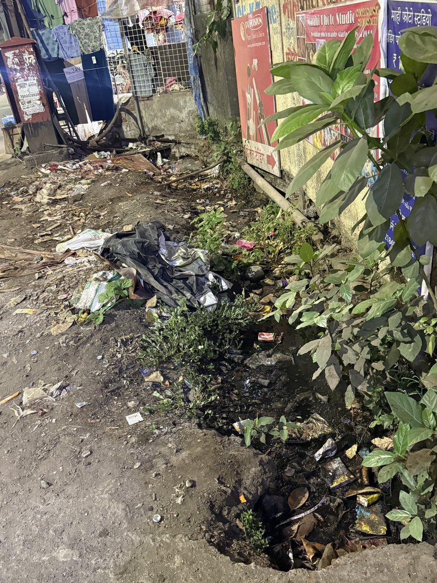 mkshanklesha's tweet photo. @KDMCOfficial Ahilyabai chowk. Prakash tower opp raja hotel. Kalyan West. Barely 100 metres from kdmc.  
Please make footpath and clean the gutter. https://t.co/tyULuqS3mf