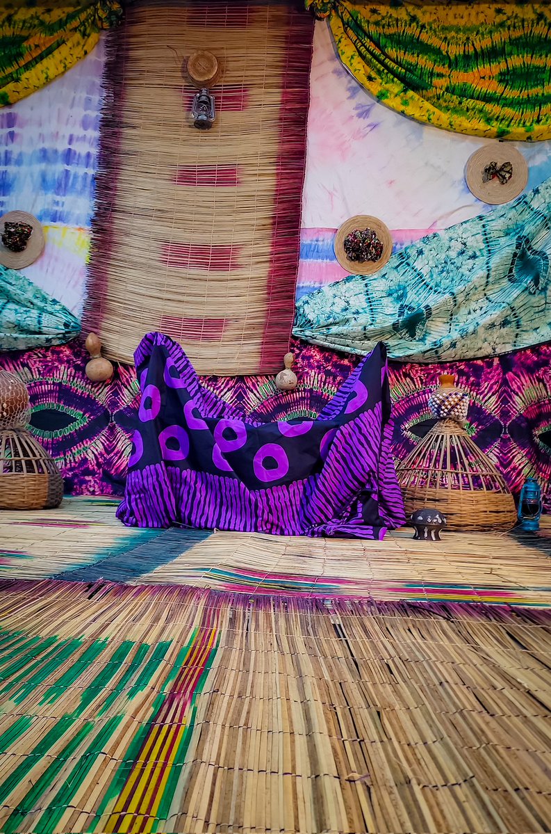 Wikimediayo's tweet photo. Before the voices took over and the competition began, there was this moment of pure serenity. 

Every detail of our stage setup at the J. Randle Centre was intentionally crafted to honour the rich aesthetics, textures, and soul of Yoruba heritage.

​From the traditional backdrops to the cultural symbols, we wanted our storytellers to step into an environment that truly felt like home—a place where the past meets the digital future.

​Swipe to take a closer look at the beautiful space where history was made today.
​#YorubaStorytellers #YorubaCulture #StageDesign #CulturalAesthetics #JRandleCentre