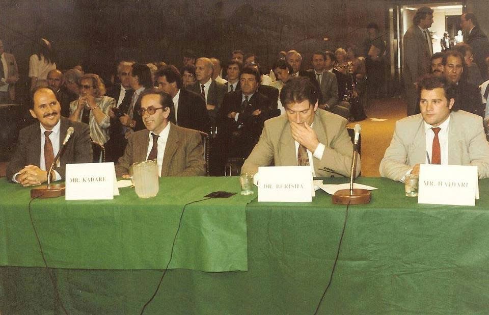 EBiberaj's tweet photo. Flashback: May 22, 1991

A landmark day: Ismail Kadare, Sali Berisha, and Azem Hajdari testifying before the U.S. Helsinki Commission as Albania took its first fragile steps toward political pluralism. Their words reflected the democratic hopes of a traumatized nation emerging from one of Europe’s harshest communist regimes.

Thirty‑five years later, the aspirations of that moment remain part of Albanians’ collective memory — a reminder of how far Albania has traveled and how much of that early democratic promise still invites sober reflection.