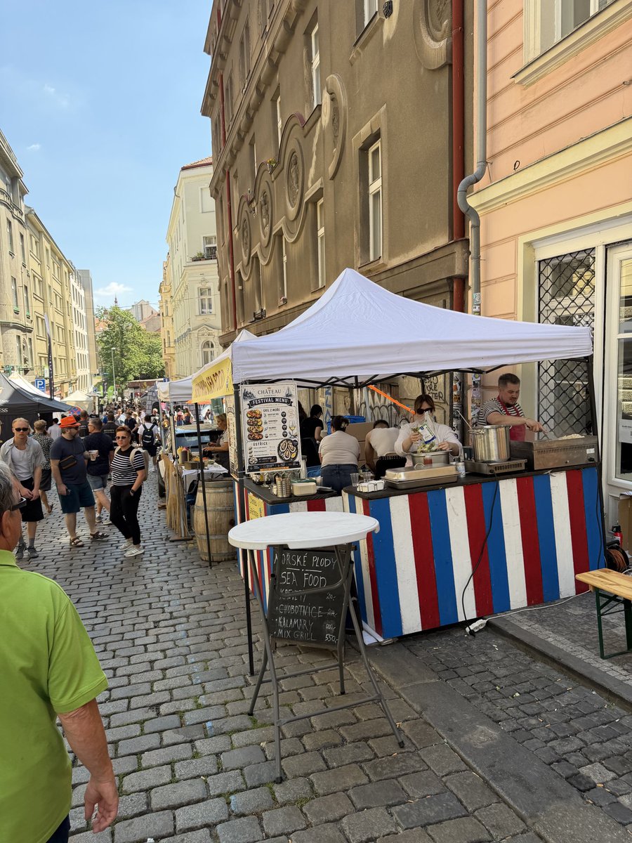 CzechPlease's tweet photo. Popped by Korso Krymska street festival. Fried chicken kimchi sandwich at Jam &amp; Co looked great. But I didn’t try anything. The DJ blasting too loud set off a car alarm &amp; it was too hot to hang. I just wanted out. Went to Grebovka Pavilon for mid food in a beautiful park instead. https://t.co/HP9KSgvm4c