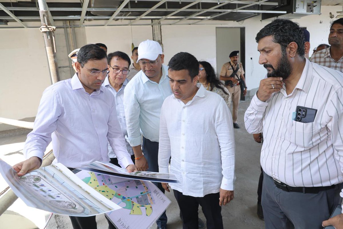 DholeraOfficial's tweet photo. Hon’ble Deputy Chief Minister of Gujarat, Shri Harsh Sanghavi visited Dholera SIR today along with senior officials from the Government of Gujarat to review the rapidly advancing industrial and social infrastructure developments shaping India’s first Greenfield smart industrial city.

During the visit, the Hon’ble Deputy Chief Minister undertook a comprehensive review of the upcoming social infrastructure facilities being developed to support the city’s growing industrial ecosystem and future workforce. The visit covered key sites including the upcoming multispeciality hospital, school, fire station, tent city, guest house, food court, as well as residential and commercial developments. Respective stakeholders engaged in detailed discussions, highlighting the progress achieved, development timelines, and the integrated urban amenities being planned within the region.

The review reflected Dholera’s larger vision of developing not merely an industrial hub, but a holistic and future-ready urban ecosystem. With large-scale investments and industries taking shape in the region, the parallel development of social and urban infrastructure is expected to play a critical role in supporting businesses, professionals, and future residents of the city.